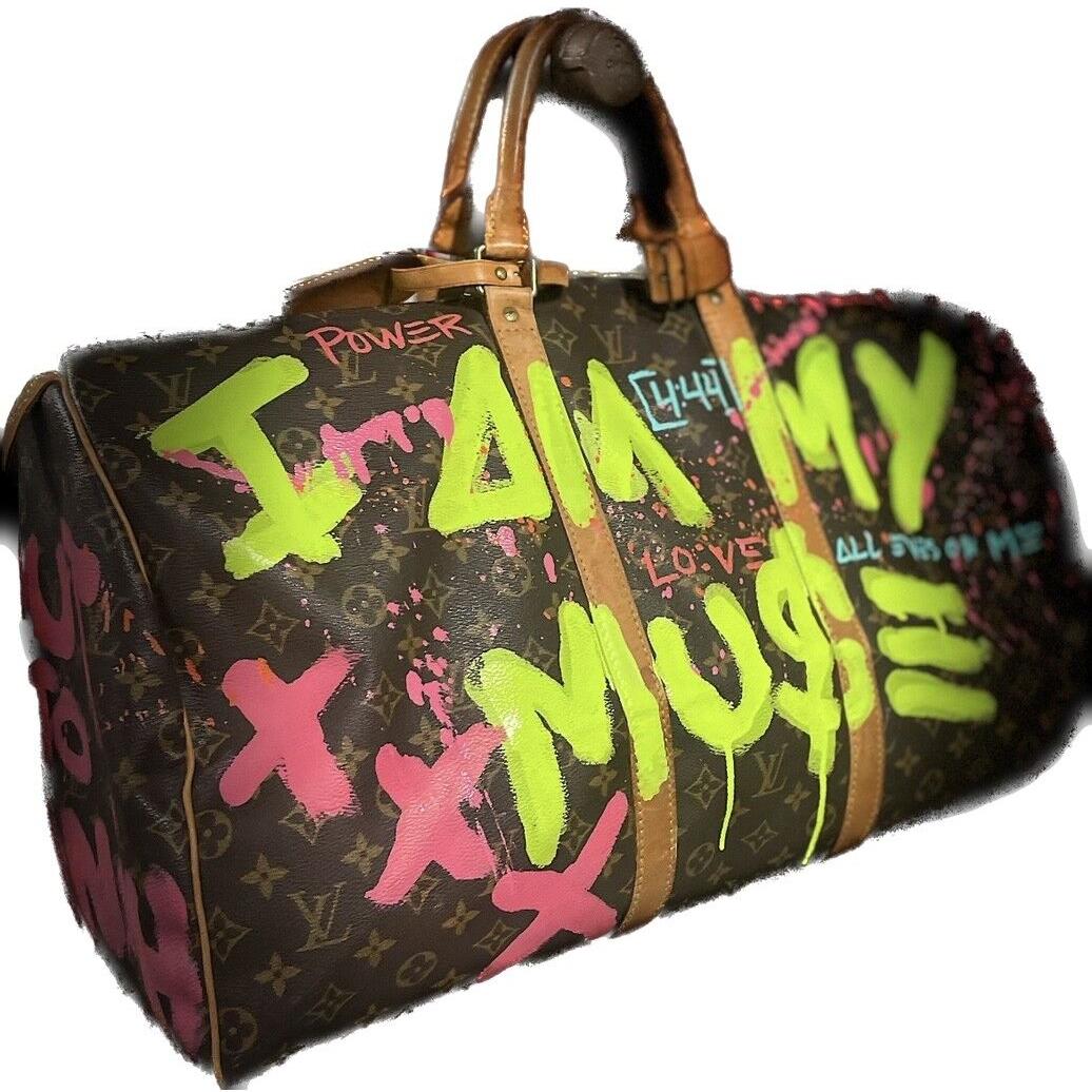 Jason Lois Louis Vuitton bag.jpg